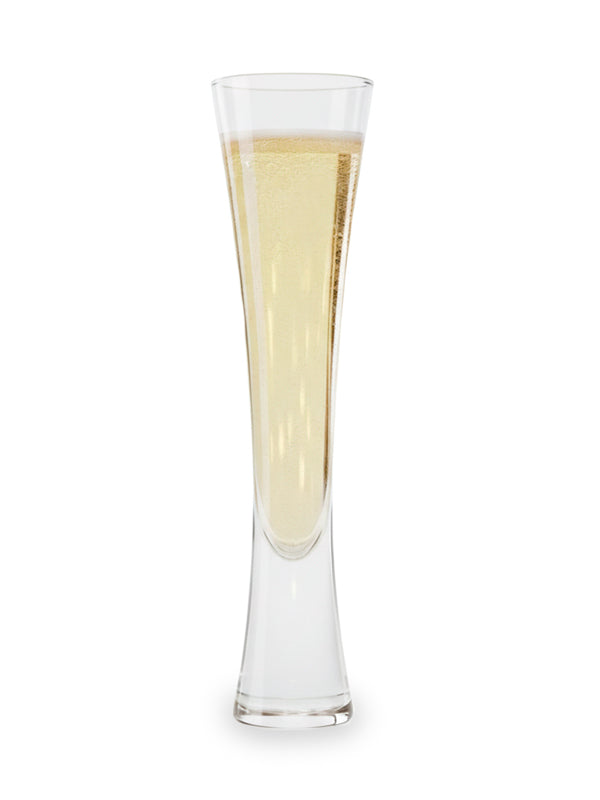 Clear glass filled with white wine on a white background