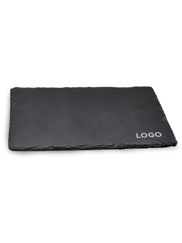 Slate charcuterie board with "LOGO" in the bottom right corner, on a white background