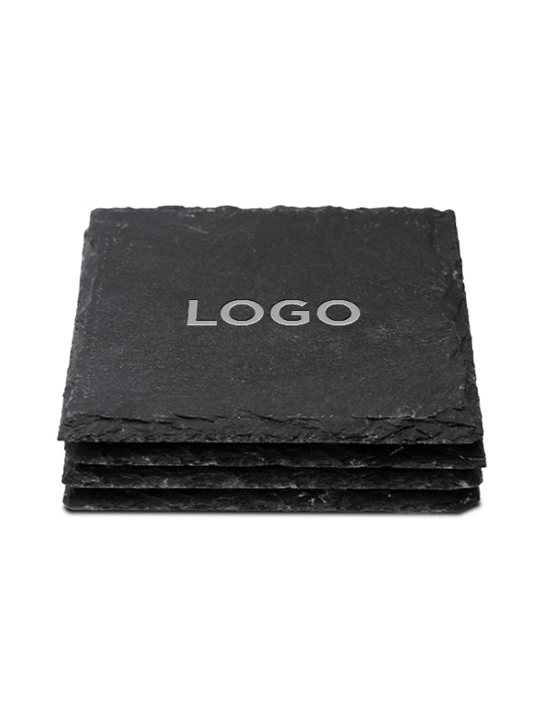 A stack of square black slate coasters on a plain white background, with the top coaster displaying the word 'LOGO' in white text.