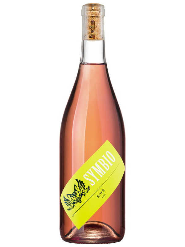 Bottle of Symbio Rosé wine with a yellow label on a white background