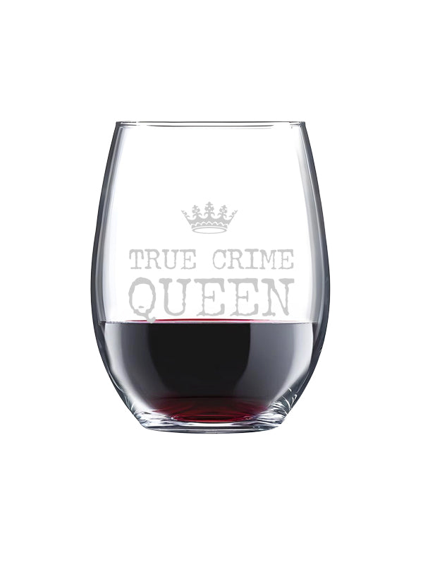 A clear stemless wine glass filled with red wine, featuring a gray frosted graphic of a crown and the text 'TRUE CRIME QUEEN' on the front, set against a plain white background.