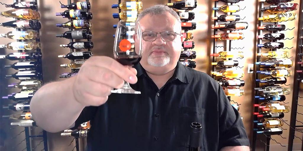 Alex toasting during the filming of a monthly Wine Club video