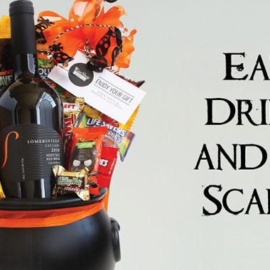 Halloween cauldron gift with wine and candy