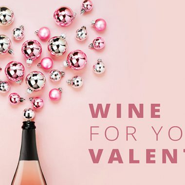 Wine for Your Valentine - sparkling wine bottle with ornaments in a heart shape