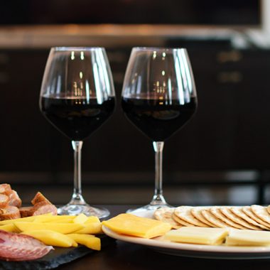Wine with meats, cheese and crackers for movie night