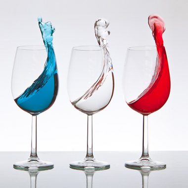 Blue, white and red colored wine