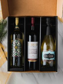 Gift box with one white wine, one red wine and one sparkling