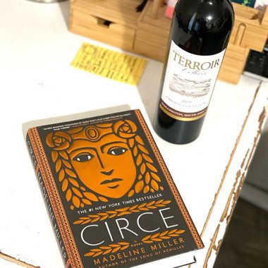 A bottle of Terroir Cellars 2019 Cabernet Sauvignon next to a hard cover copy of "Circe"