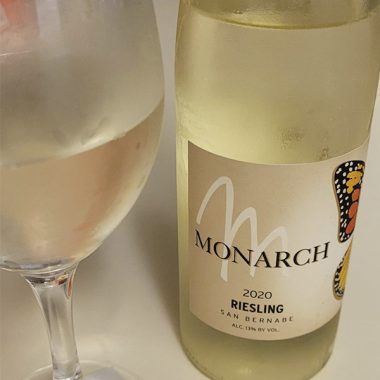 A close up of a chilled glass and bottle of Monarch 2020 Riesling