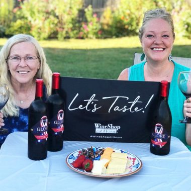 Two women tasting Glory Cellars wines outdoors